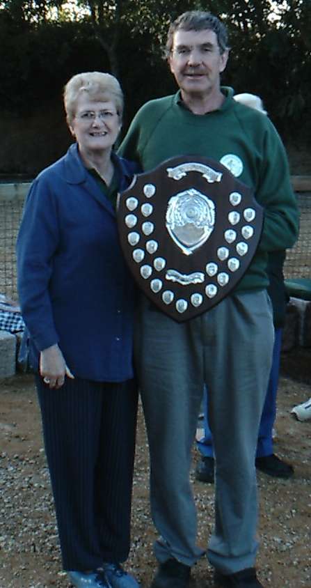 Shela Birch presenting the Birch+Caberet Trophy to Frank Morel jnr from the Carrefour Petanque Club